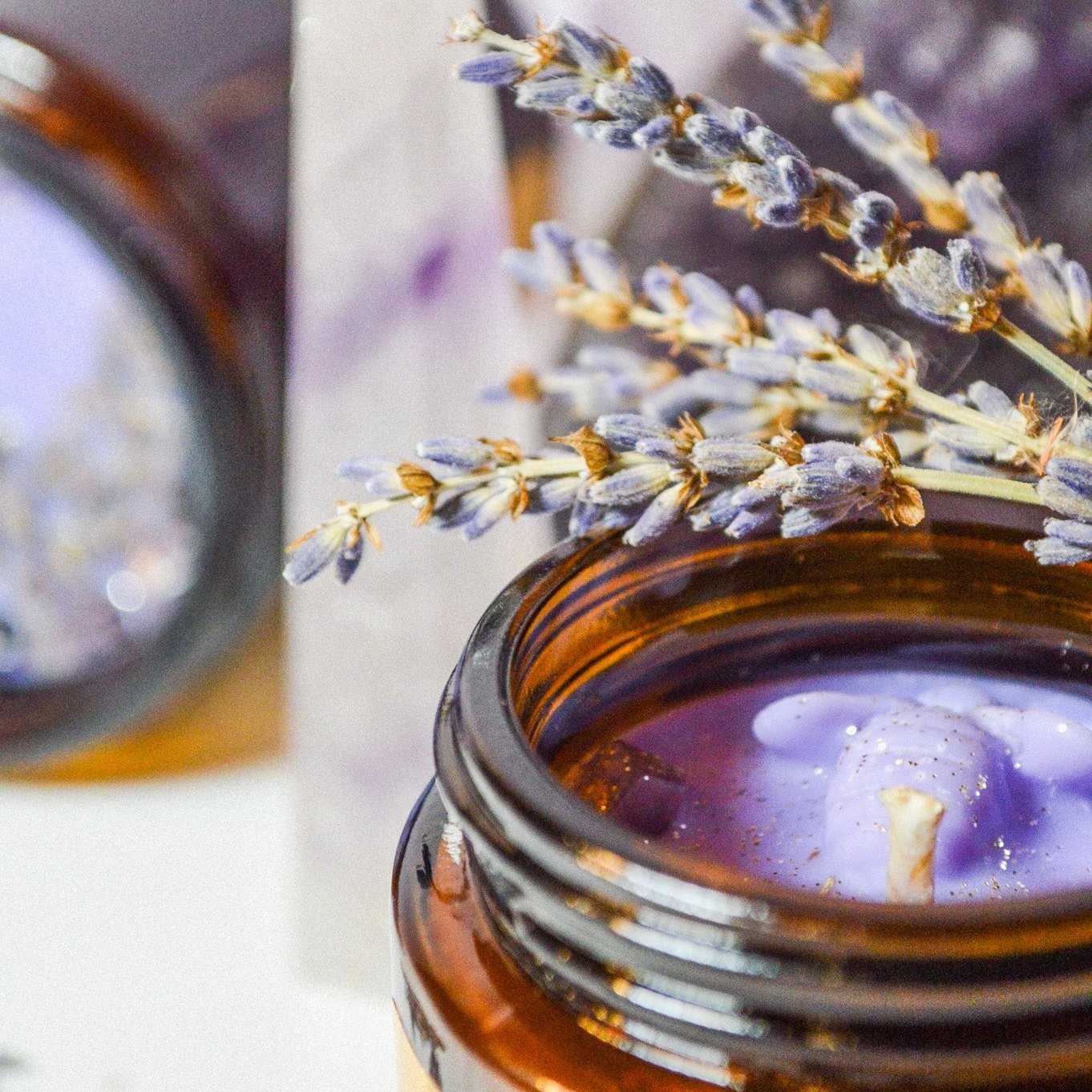 Lavender candle with amethyst crystal